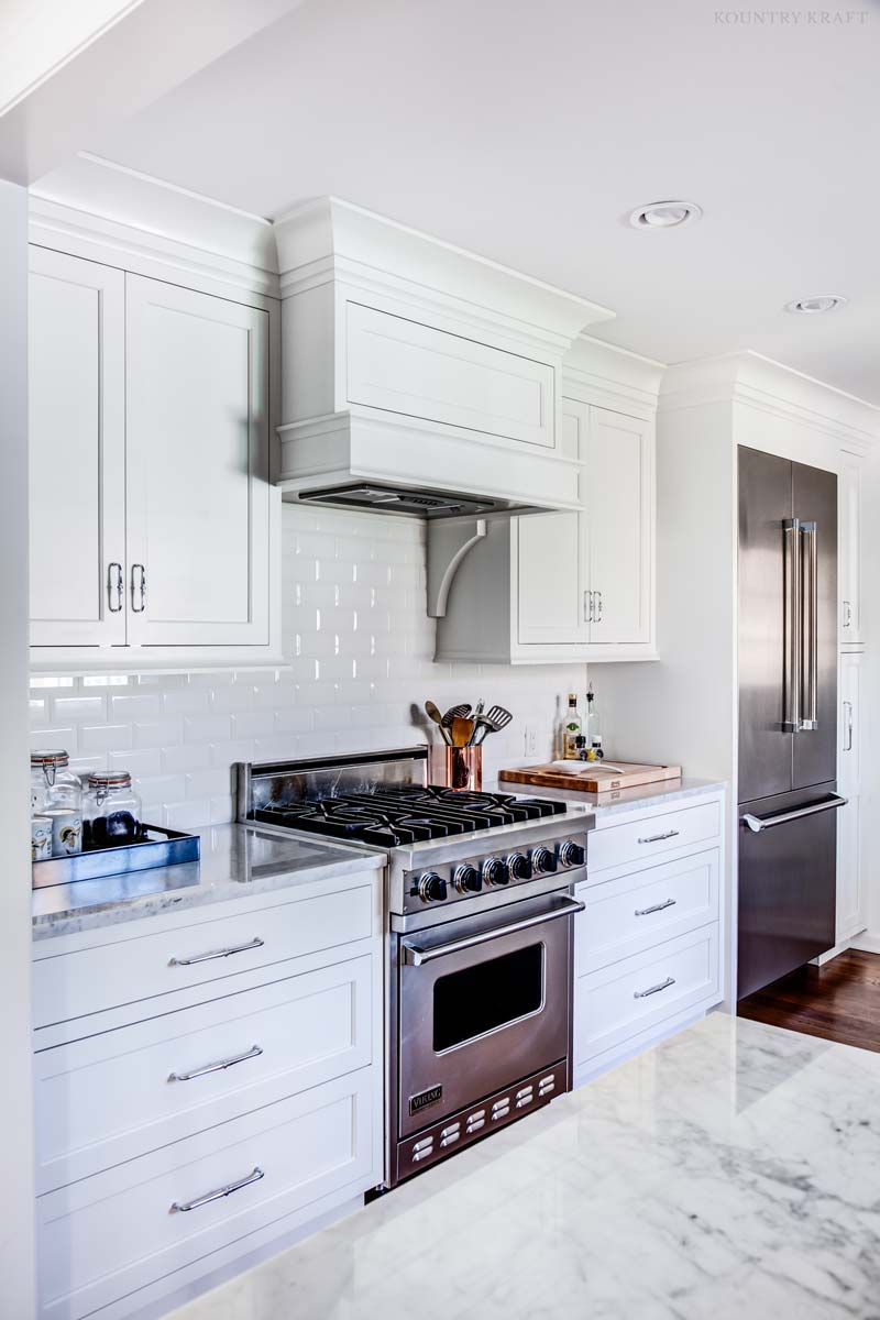 A Hidden Range Hood is a Must Have for a Designer's Dream Kitchen a designers dream kitchen must include a hidden range hood