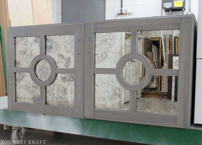Antique-Mirrored Kitchen Cabinet Ideas Mirrored cabinets are one of the popular kitchen cabinet ideas