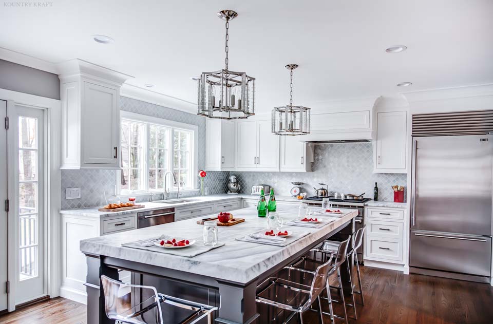 A Custom Range Hood Design Creates a Kitchen Focal Point A kitchen focal point was created using a custom range hood and custom cabinetry