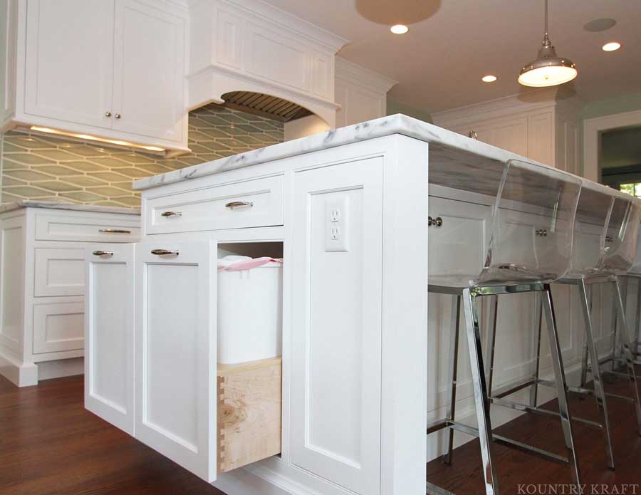 Pull-Out Trash Bins Provide More Floor Space pull out trash bins for small kitchen storage ideas